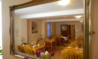 Dining area shown in the Pacific Hotel gallery